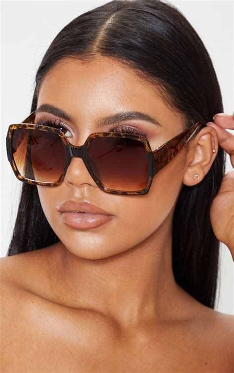 guess tortoise shell oversized sunglasses.